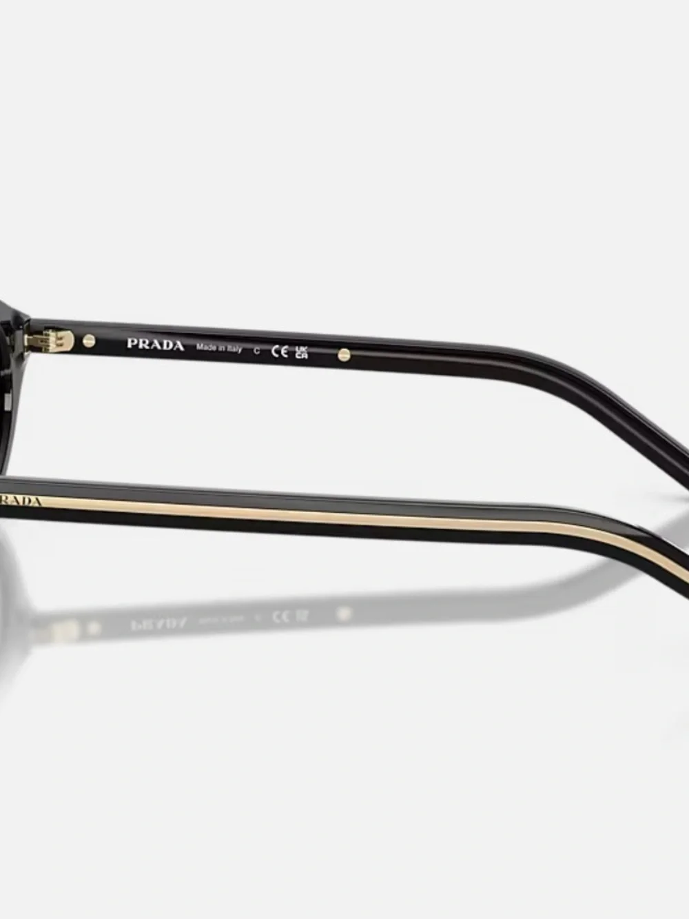 Prada Black Cat-Eye Sunglasses with Gold Accents - Picture 3 of 12